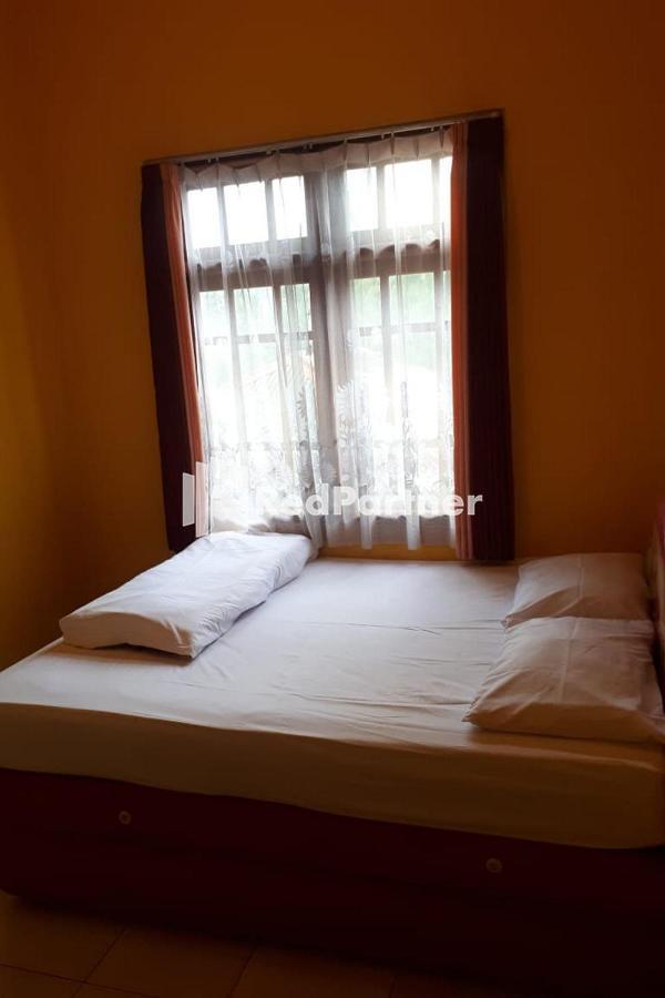 Bromo Indah Lestari Homestay Mitra Reddoorz パスルアン エクステリア 写真