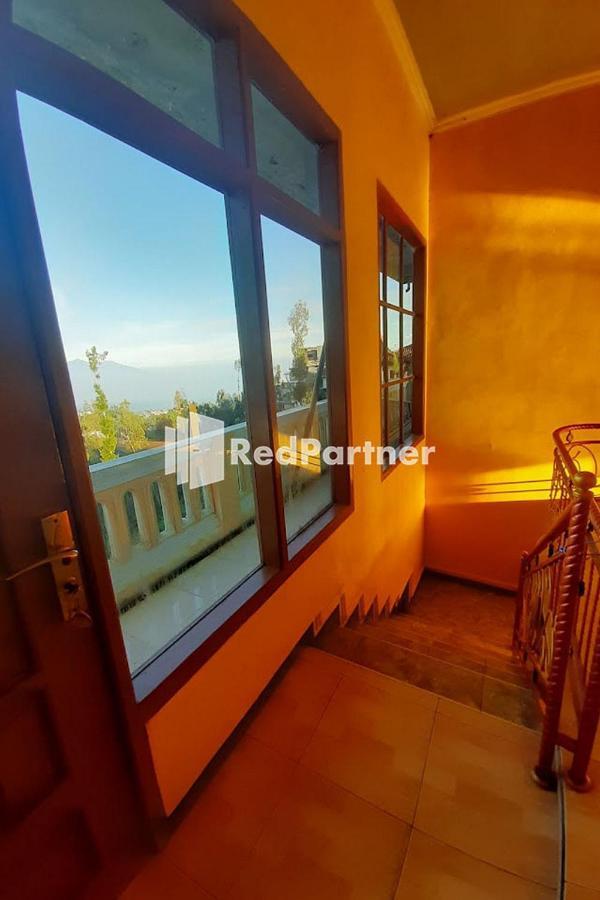 Bromo Indah Lestari Homestay Mitra Reddoorz パスルアン エクステリア 写真